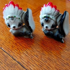 Vintage skunk figurines